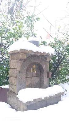 a brick oven with snow on top of it at Butik Hotel Maşukiye in Masukiye
