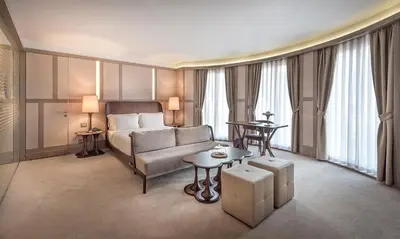 a hotel room with a couch and a table at The Stay Nisantasi in Istanbul