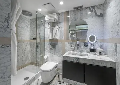 a bathroom with a toilet and a sink and a shower at The Stay Nisantasi in Istanbul