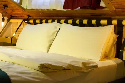 a bed with two pillows on top of it at Hot Budget Ortakoy in Istanbul