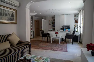 a living room with a couch and a table at Sultanahmet Cesme Hotel in Istanbul