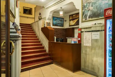 a staircase in a restaurant with a stair case at Erenler HoTeL & HosTeL in Istanbul
