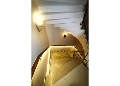 a staircase in a building with a light at the top at Hotel Grand Umit in Istanbul