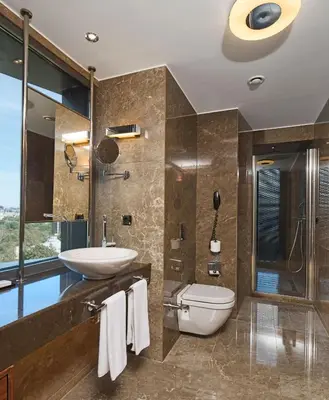 a bathroom with a sink and a toilet at Gezi Hotel Bosphorus, Istanbul, a Member of Design Hotels in Istanbul