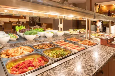 a buffet line with many different types of food at Vicenza Hotel Istanbul Old City in Istanbul