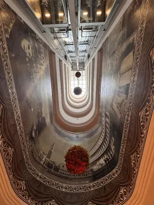 a room with a plant in the middle of a building at Vicenza Hotel Istanbul Old City in Istanbul