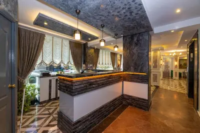 a bar in the middle of a room with a counter at Hotel Yesilpark in Istanbul