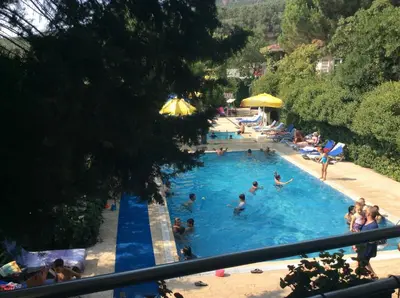 a group of people in a swimming pool at Atamer Doga Resort in Gemlik