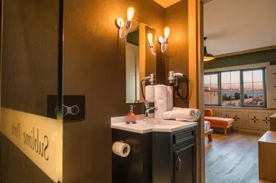 a bathroom with a sink and a mirror at Sublime Porte Hotel in Istanbul