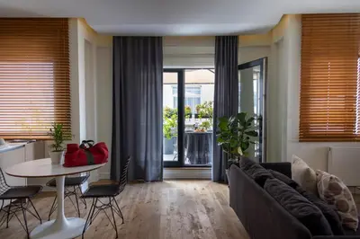 a living room with a couch and a table at GALATA M84 in Istanbul