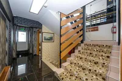 a staircase in a building with a stair case at Grand Ons Hotel in Istanbul