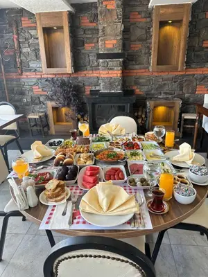 a table with a lot of food on it at Grand Ons Hotel in Istanbul