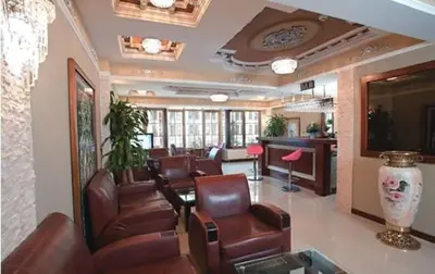 a lobby with leather chairs and a waiting room at Hotel Bazaar in Istanbul