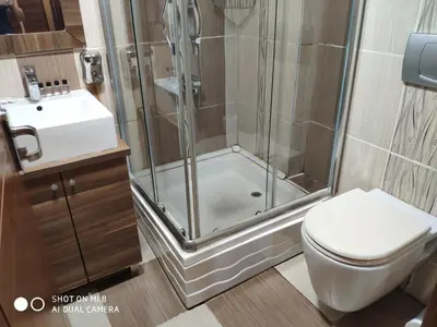 a bathroom with a shower and a toilet and a sink at Hotel Bazaar in Istanbul