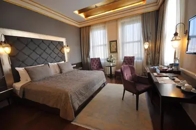 a hotel room with a bed and a desk and a desk at Levni Hotel & SPA - Special Category in Istanbul