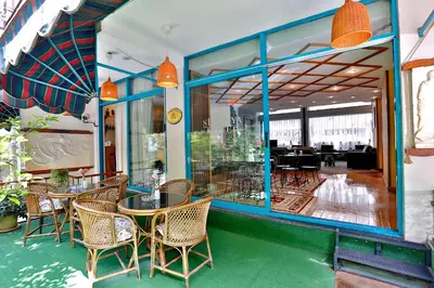 a restaurant with tables and chairs and a cafeteria at Sidonya Hotel in Istanbul