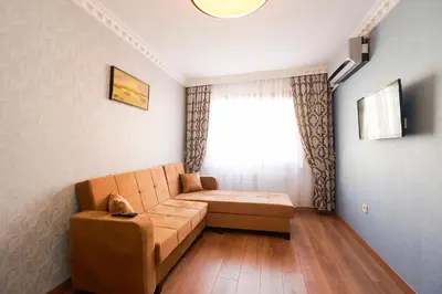 a living room with a couch and a window at Authentic Apartments OldCity in Istanbul