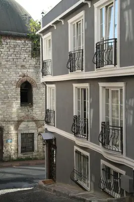 a gray building with balconies on the side of it at Basileus Hotel in Istanbul