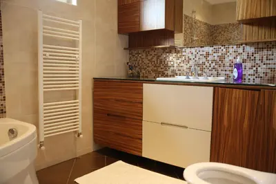 a bathroom with a toilet and a sink at Damla Pansiyon in Sapanca