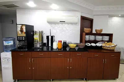 a kitchen with a counter with a blender on it at Lyon Hotel İstanbul in Istanbul
