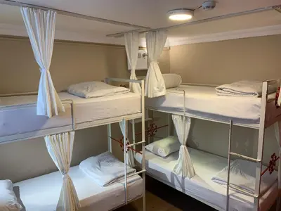 a group of bunk beds in a room at Antique Hostel in Istanbul