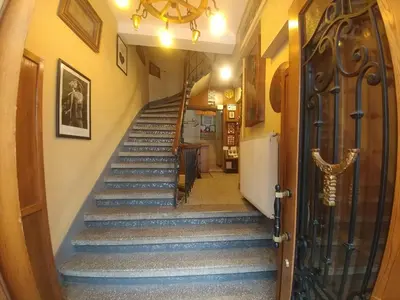 a staircase in a house with a hallway at Antique Hostel in Istanbul
