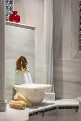 a bathroom with a sink and a shower at Seminal Hotel Taksim in Istanbul