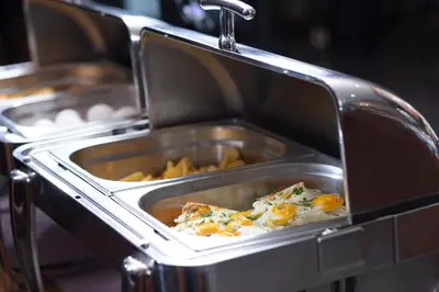 a tray of food in a toaster oven with food at Hotel Momento - Special Category in Istanbul