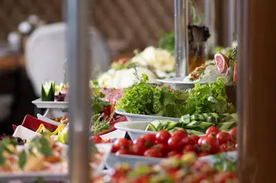 a buffet filled with lots of different types of food at Hotel Momento - Special Category in Istanbul