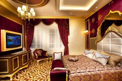 a hotel room with a bed and a television at Limak Yalova Thermal Boutique Hotel in Gokcedere