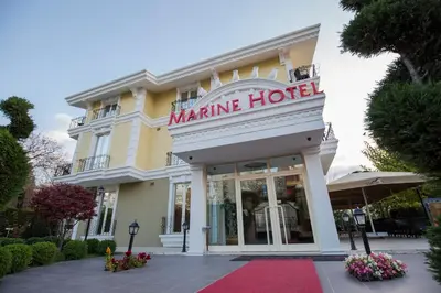 a building with a sign that reads marine hotel at Pendik Marine Hotel in Istanbul