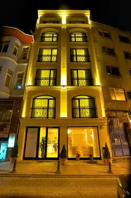 a large building with lights on it at night at Hotel Perula & SPA in Istanbul