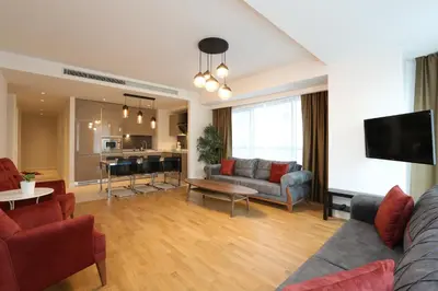 a living room with a couch and a table at Classy Suite Taksim in Istanbul