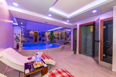 a living room with a pool in a house at Bekdas Hotel Deluxe & Spa in Istanbul