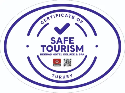 a logo of a safe tourism sign in a circle at Bekdas Hotel Deluxe & Spa in Istanbul