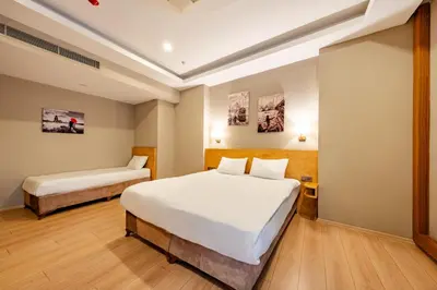 a bedroom with two beds in a room at Beyoglu MLS Hotel in Istanbul