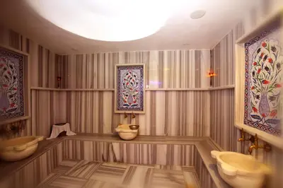 a bathroom with two sinks and two toilets at Beyoglu MLS Hotel in Istanbul