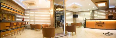 a restaurant with a bunch of chairs and a bar at Aspalace Hotel The Istanbul Old City in Istanbul