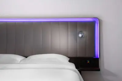 a bed with a purple light on top of it at Park Inn by Radisson Istanbul Airport Odayeri in Istanbul