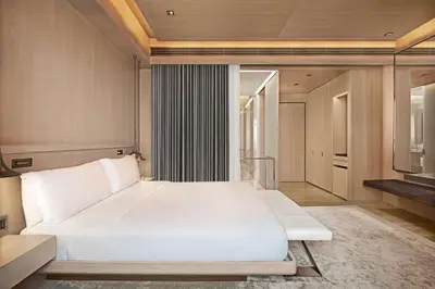 a bedroom with a large white bed in a room at Hyatt Centric Levent Istanbul in Istanbul
