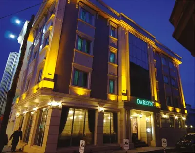 a building on a city street at night at Dareyn Hotel in Istanbul