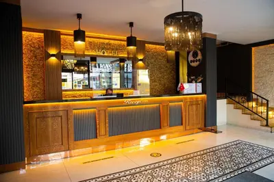 a bar in a restaurant with a lobby at Emirtimes Hotel Kadıköy in Istanbul
