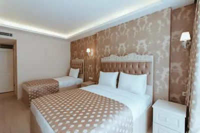 a bedroom with two beds in a room at Istanroom by Keo in Istanbul