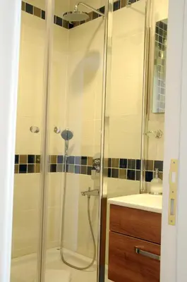 a bathroom with a shower and a sink at Sarnic Premier Hotel in Istanbul