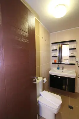 a bathroom with a toilet and a sink at Agora Boutique Hotel & Bistro in Istanbul