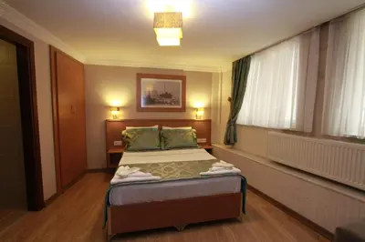 a small bedroom with a bed in a room at Agora Boutique Hotel & Bistro in Istanbul