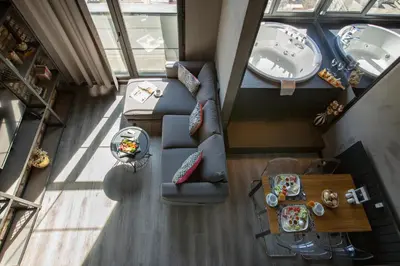 an overhead view of a living room with a couch and a table at Cityloft 161 in Istanbul