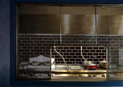 a kitchen with a counter with pots and pans at Dundar Hotel & Spa in Istanbul