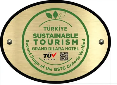 a sign that reads turmeric sustainable tourism on a wooden plate at Grand Dilara Hotel in Istanbul