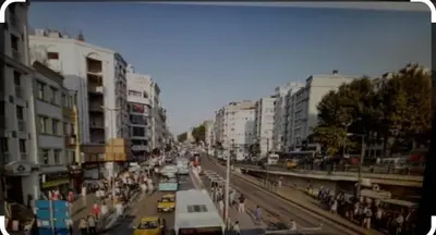 a busy city street with people and cars and buildings at Grand Dilara Hotel in Istanbul